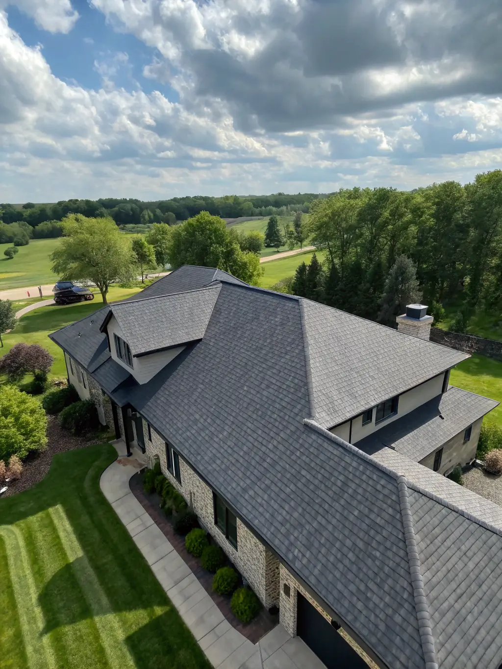 A drone shot of a completed roofing project, showcasing the quality and precision of Apex Roofing & Construction's work.